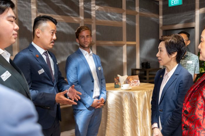 Rentalworks Group Managing Director, Alan Puah sharing insights with Minister for Sustainability and the Environment, Ms Grace Fu. PHOTO: Singapore Environmental Council.